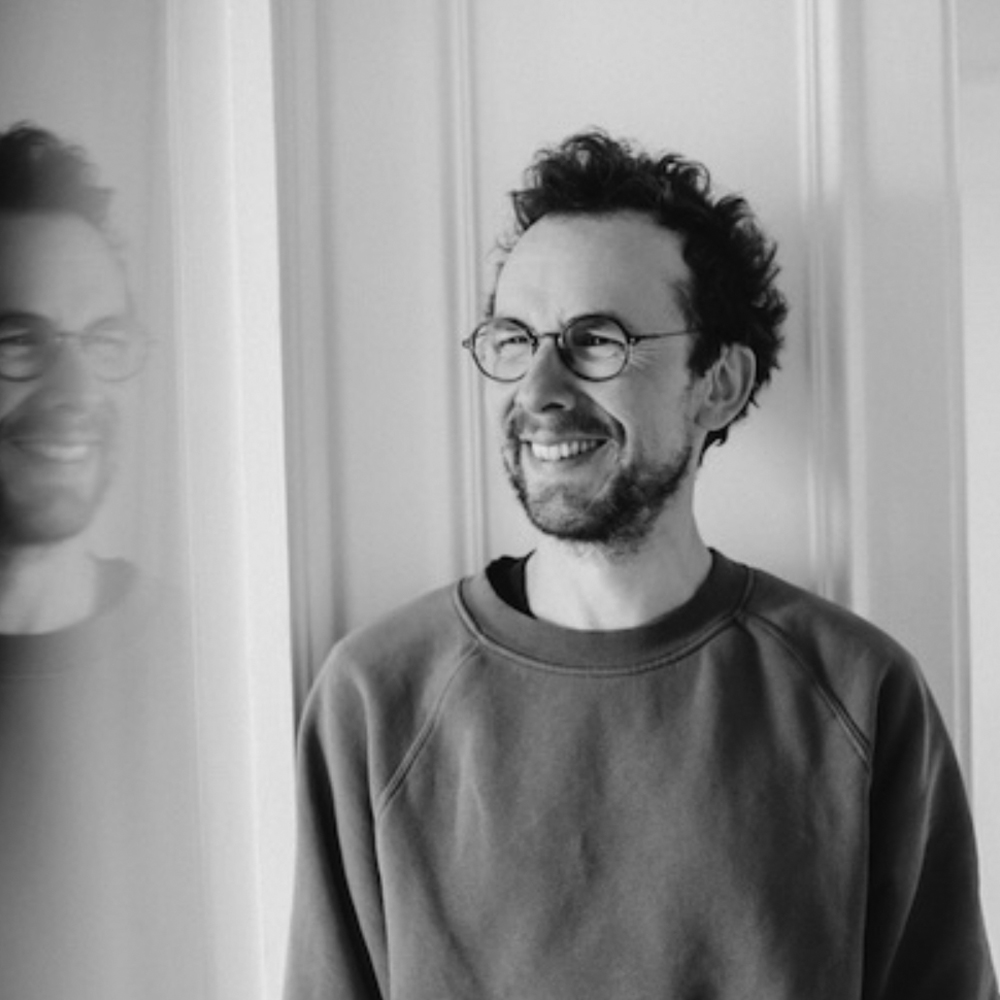 Professional headshot of Louis Clichy