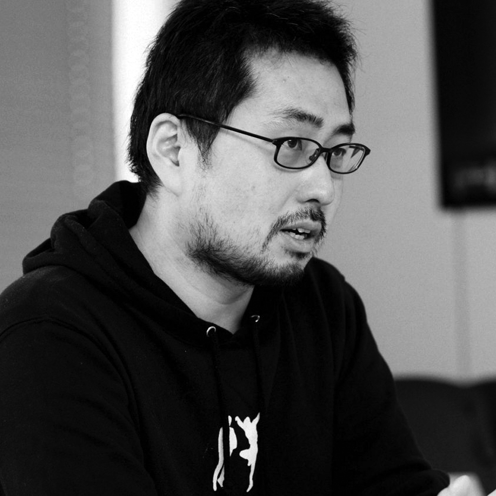 Professional headshot of Masanao Kawajiri