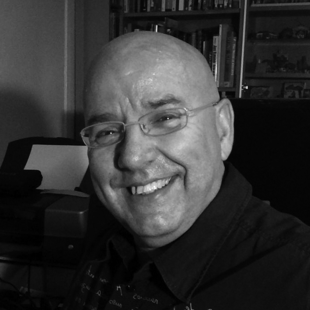 Professional headshot of Raúl García