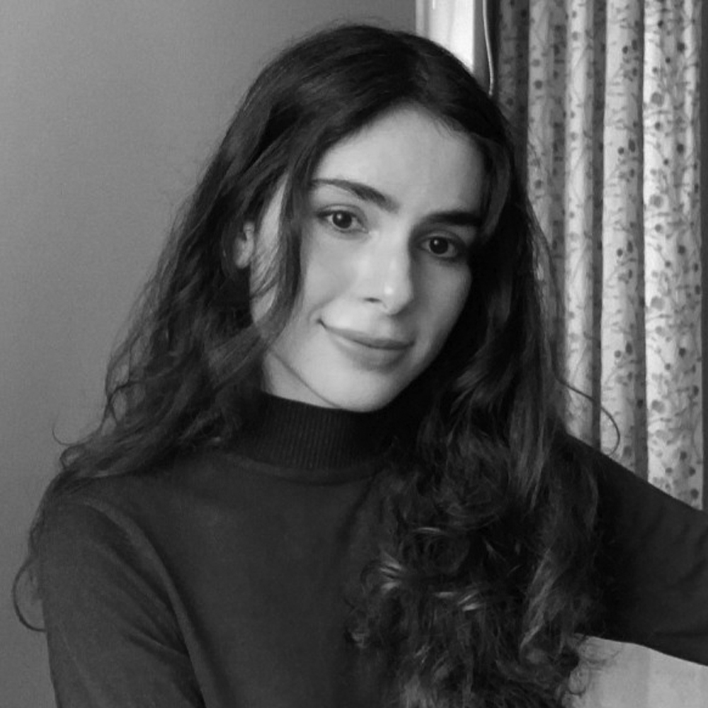 Professional headshot of Yusra Shahid