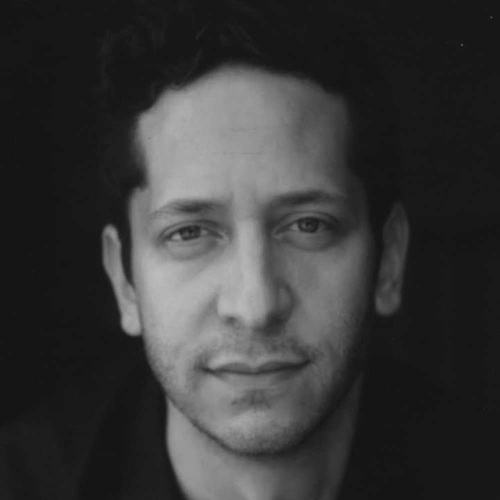 Professional headshot of Jeremy Zuckerman