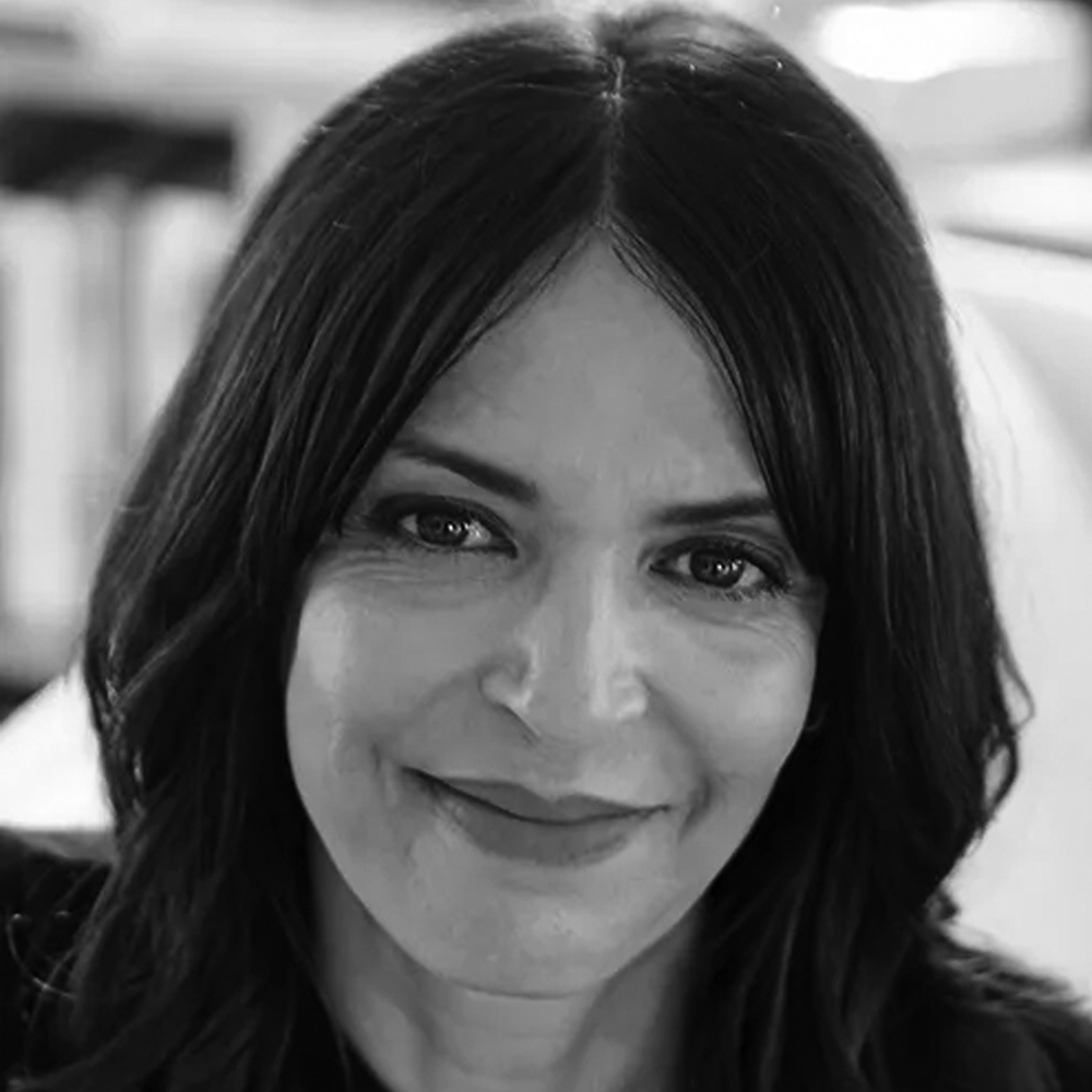 Professional headshot of Latifa Ouaou