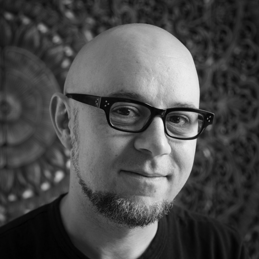 Professional headshot of Michael Dante DiMartino