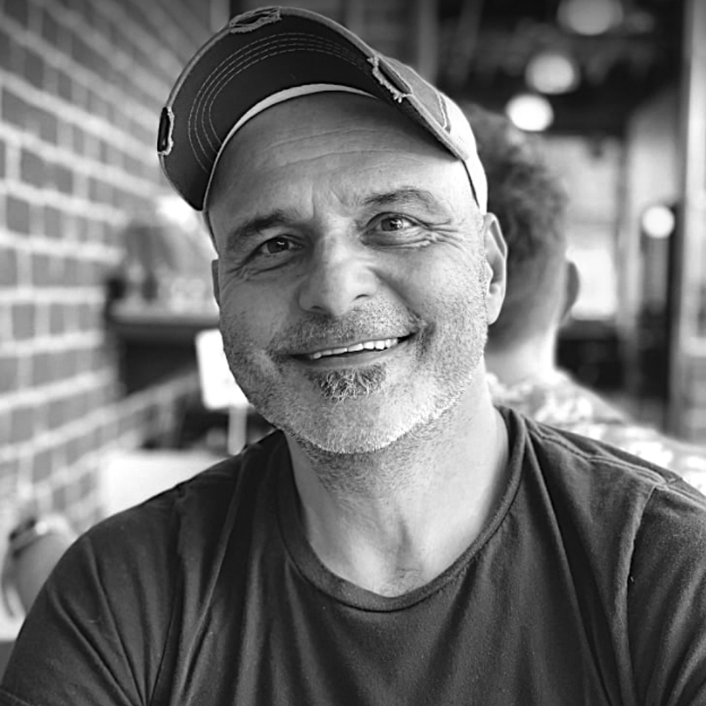 Professional headshot of Ramin Zahed