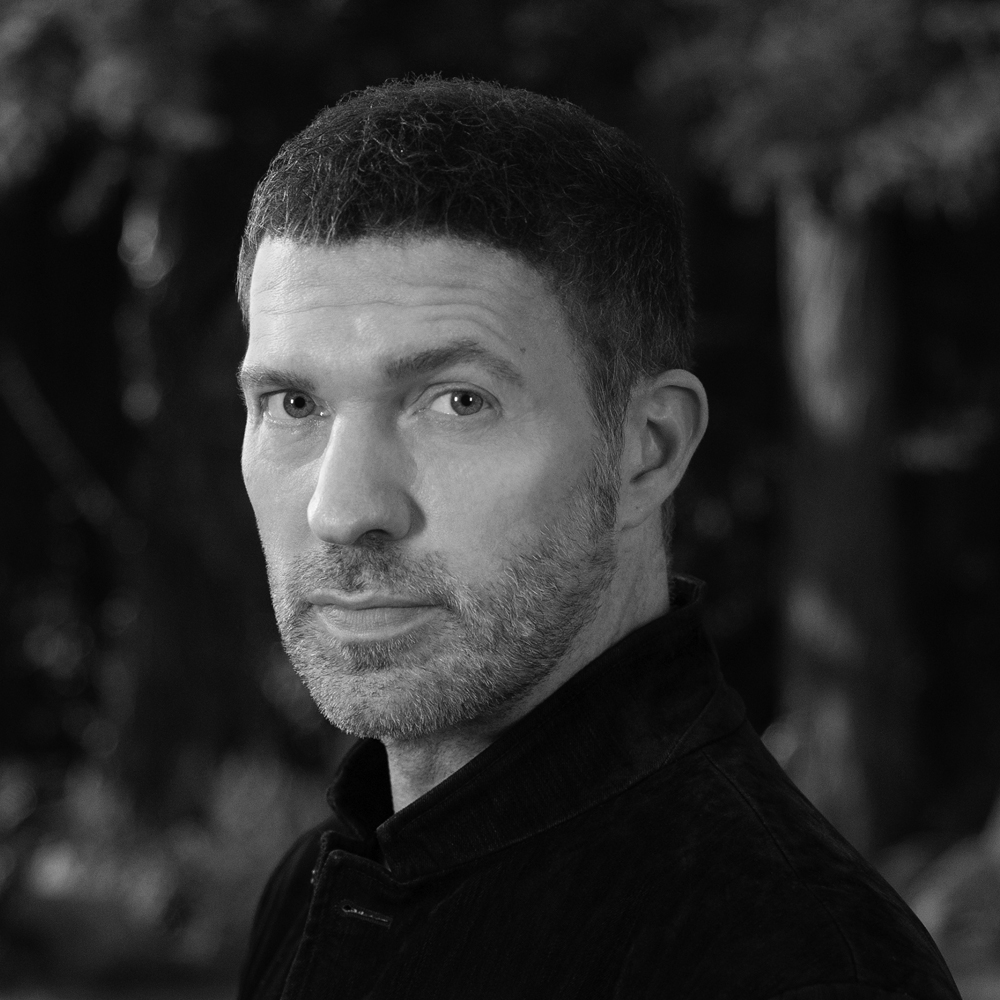 Professional headshot of Travis Knight